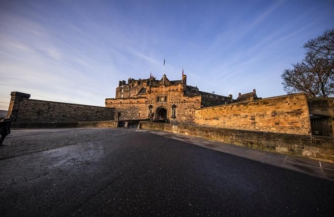 Edinburgh Castle at sunset. View of the historic national landmark from the approach.