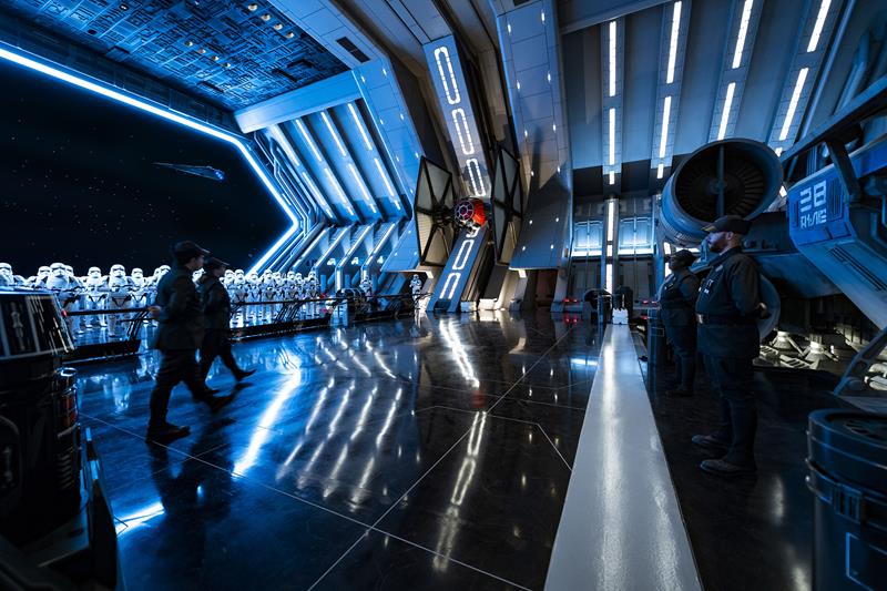 First Order troops and stormtroopers patrol the hangar bay of a Star Destroyer in Star Wars: Rise of the Resistance, the groundbreaking new attraction opening Dec. 5, 2019, inside Star Wars: Galaxy’s Edge at Disney’s Hollywood Studios in Florida and Jan. 17, 2020, at Disneyland Park in California. Guests enter the hangar bay after their ship is caught in the Star Destroyer’s tractor beam in this thrilling new Disney experience. (Matt Stroshane, photographer)
